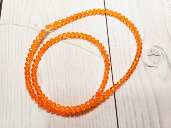 Намистини рондель 3*4 мм Помаранчовий 1 нитка