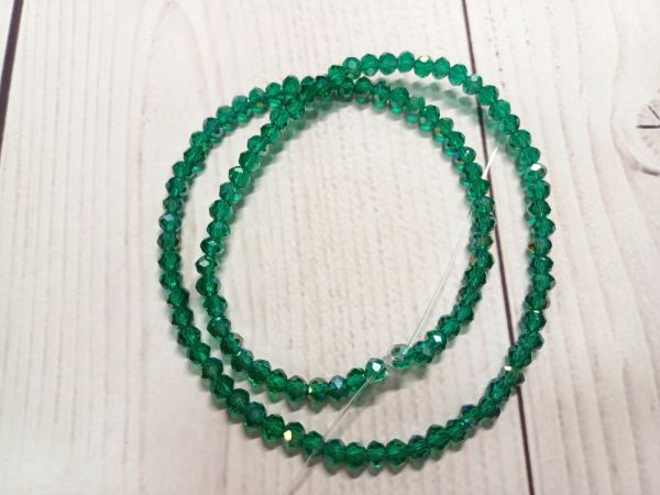 Намистини рондель 3*4 мм Смарагдовий 1 нитка